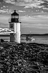 Marshall Point Light Guides Fishing Trawler Home in Maine -BW